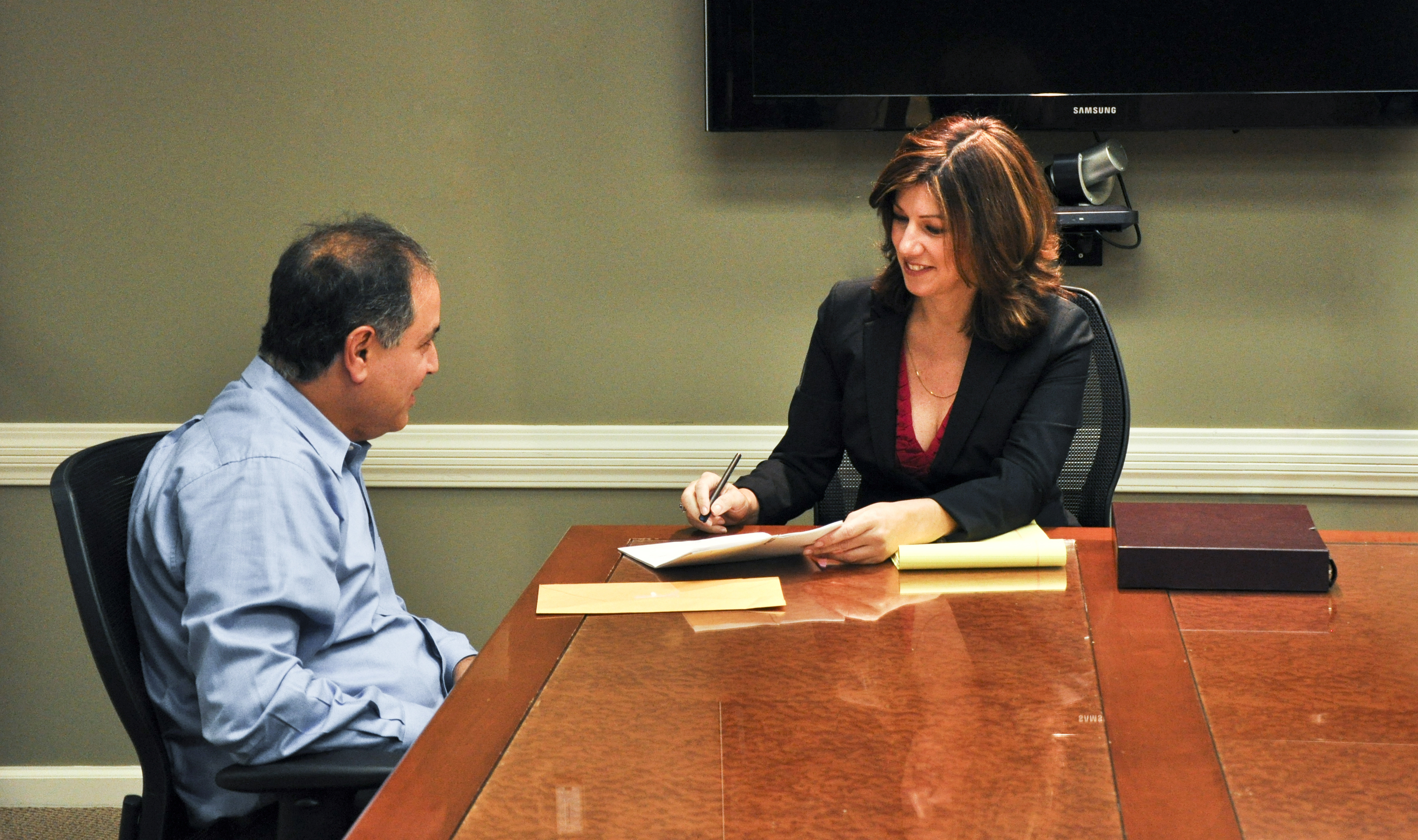 Attorney Cynthia Catalino in client's meeting